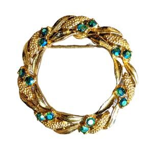 Vintage Gerry's gold-tone wreath brooch blue/green stones